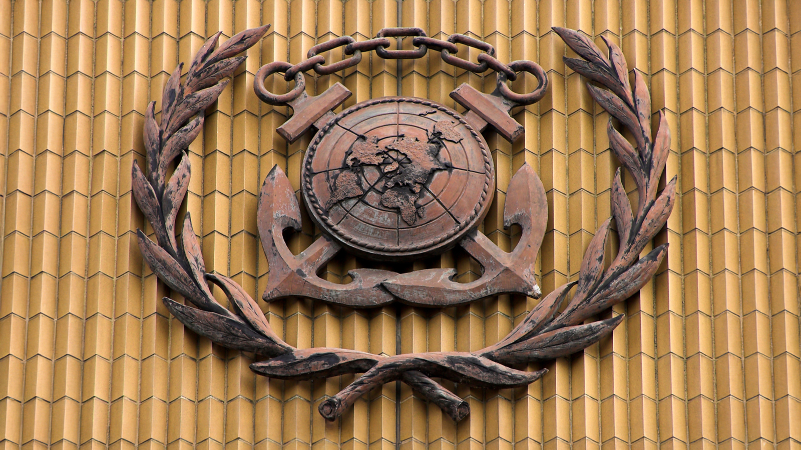 Logo for the IMO on the side of the IMO headquarters building in London