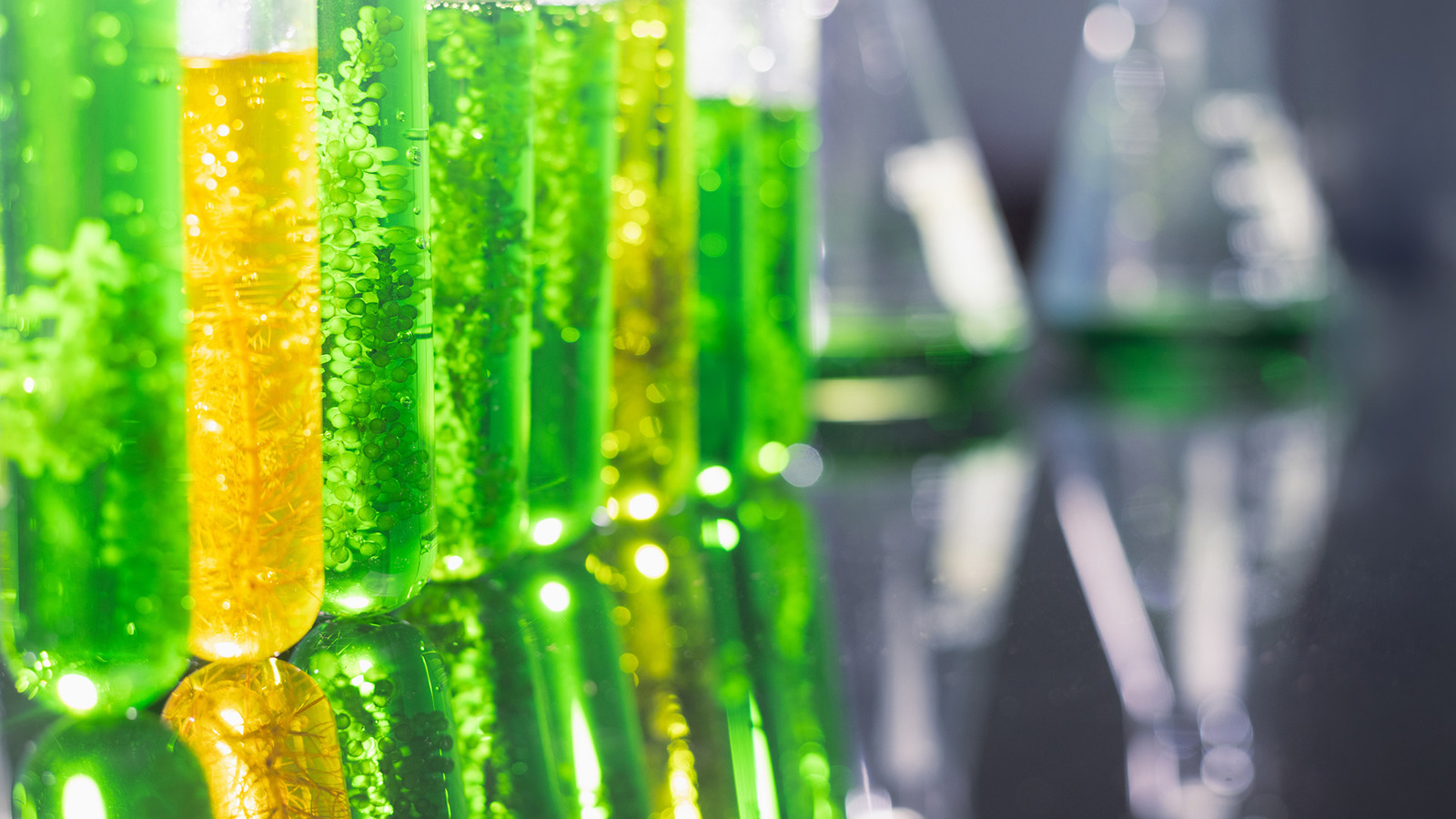 Yellow and green liquids in test tubes