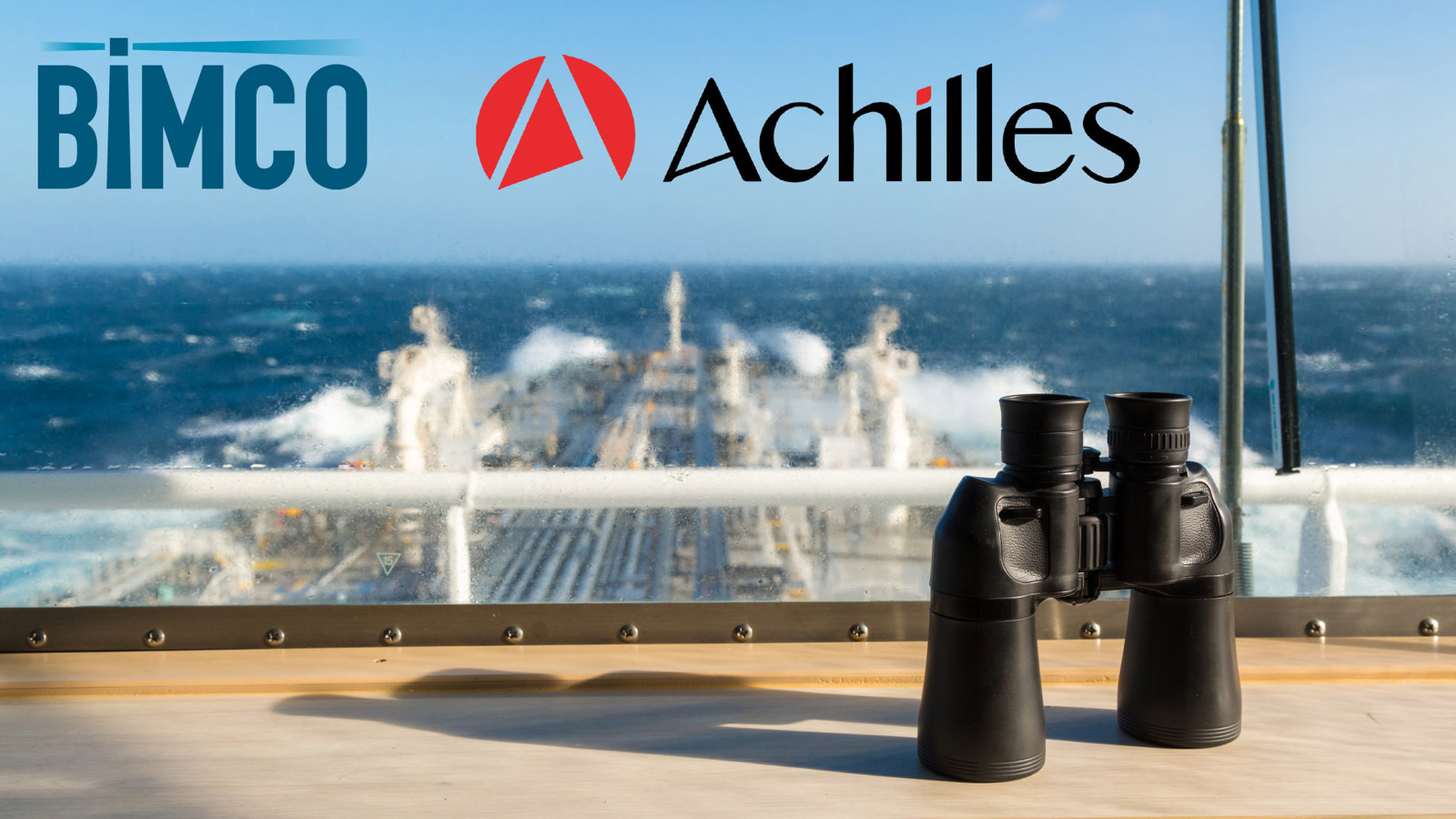 A view of the deck of a tanker ship with a pair of binoculars in the foreground