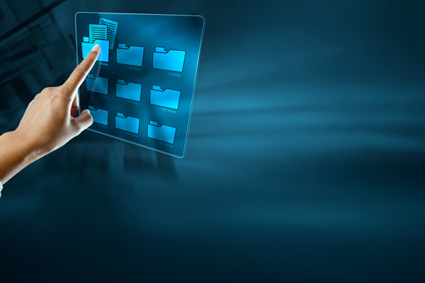 a finger pointing at a touchscreen