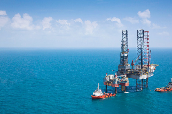 Ships sailing offshore