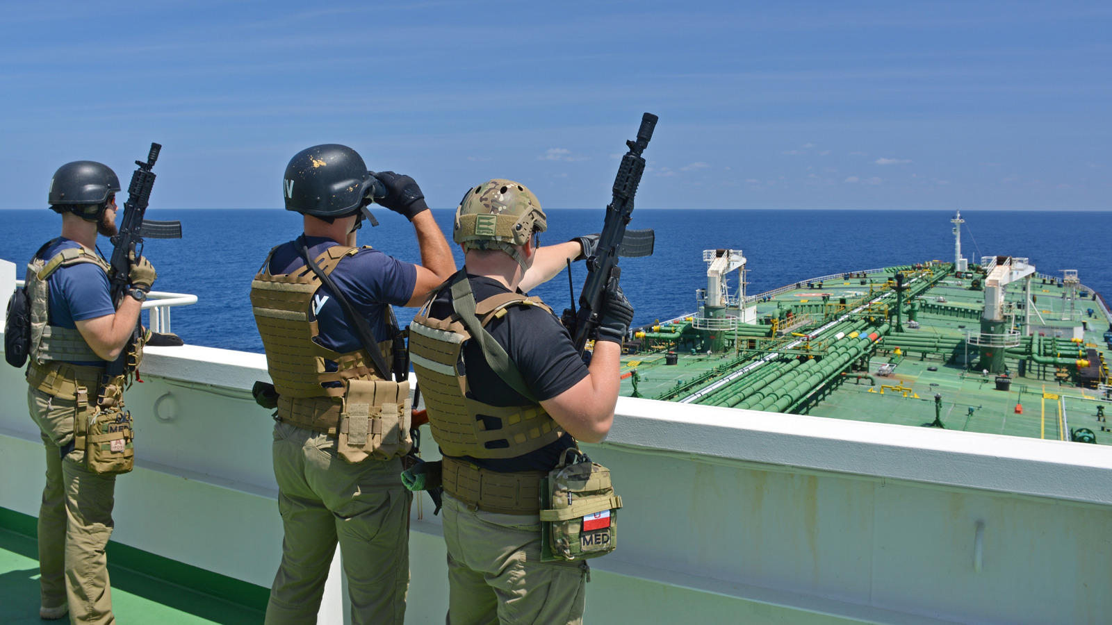 Armed security personnel on a ship