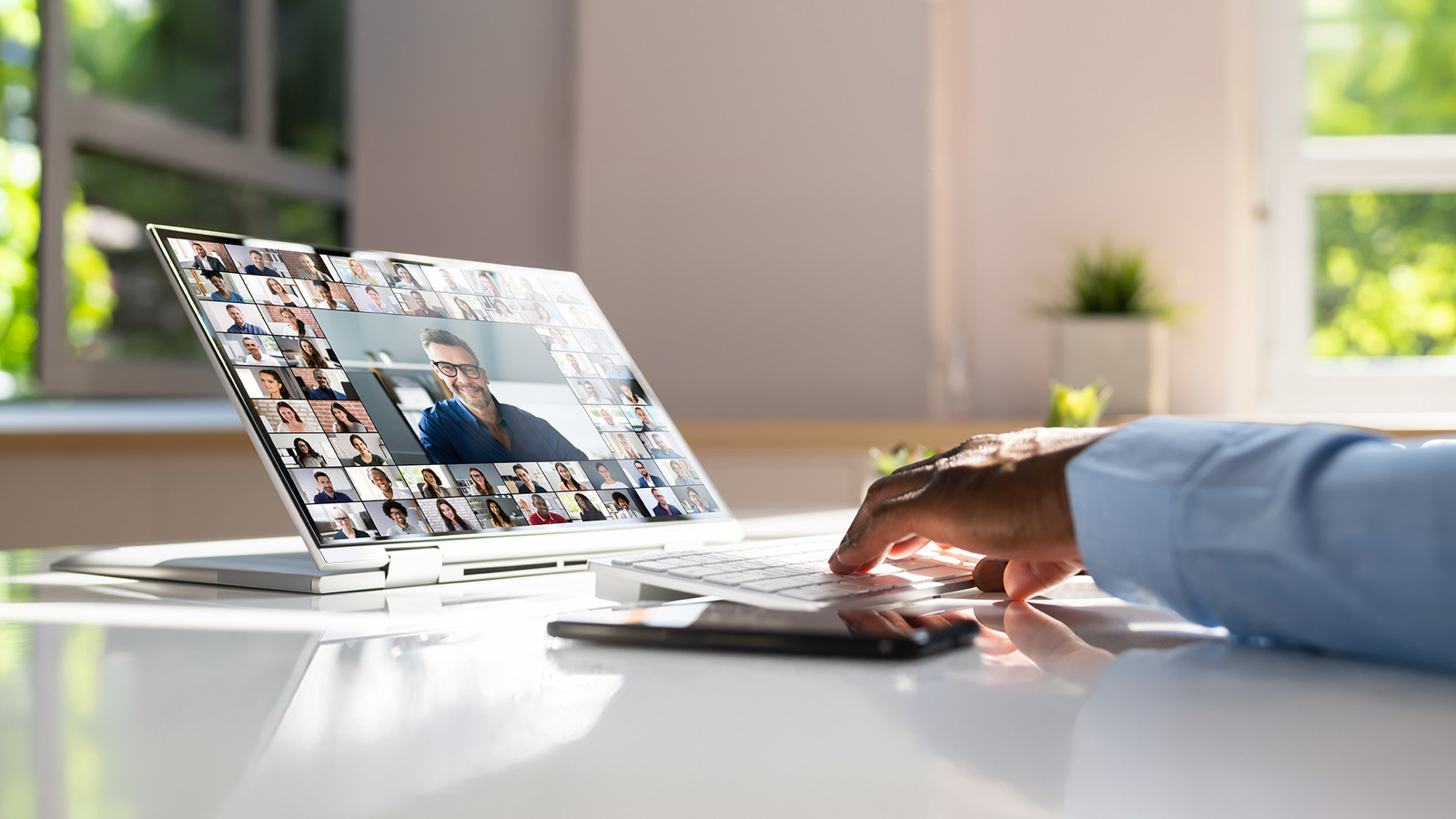 person using a laptop in a video call
