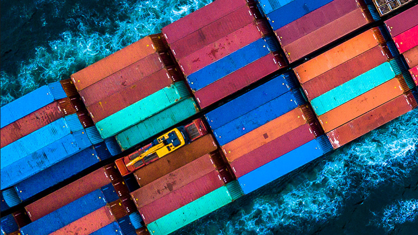 Containers on board a ship seen from above
